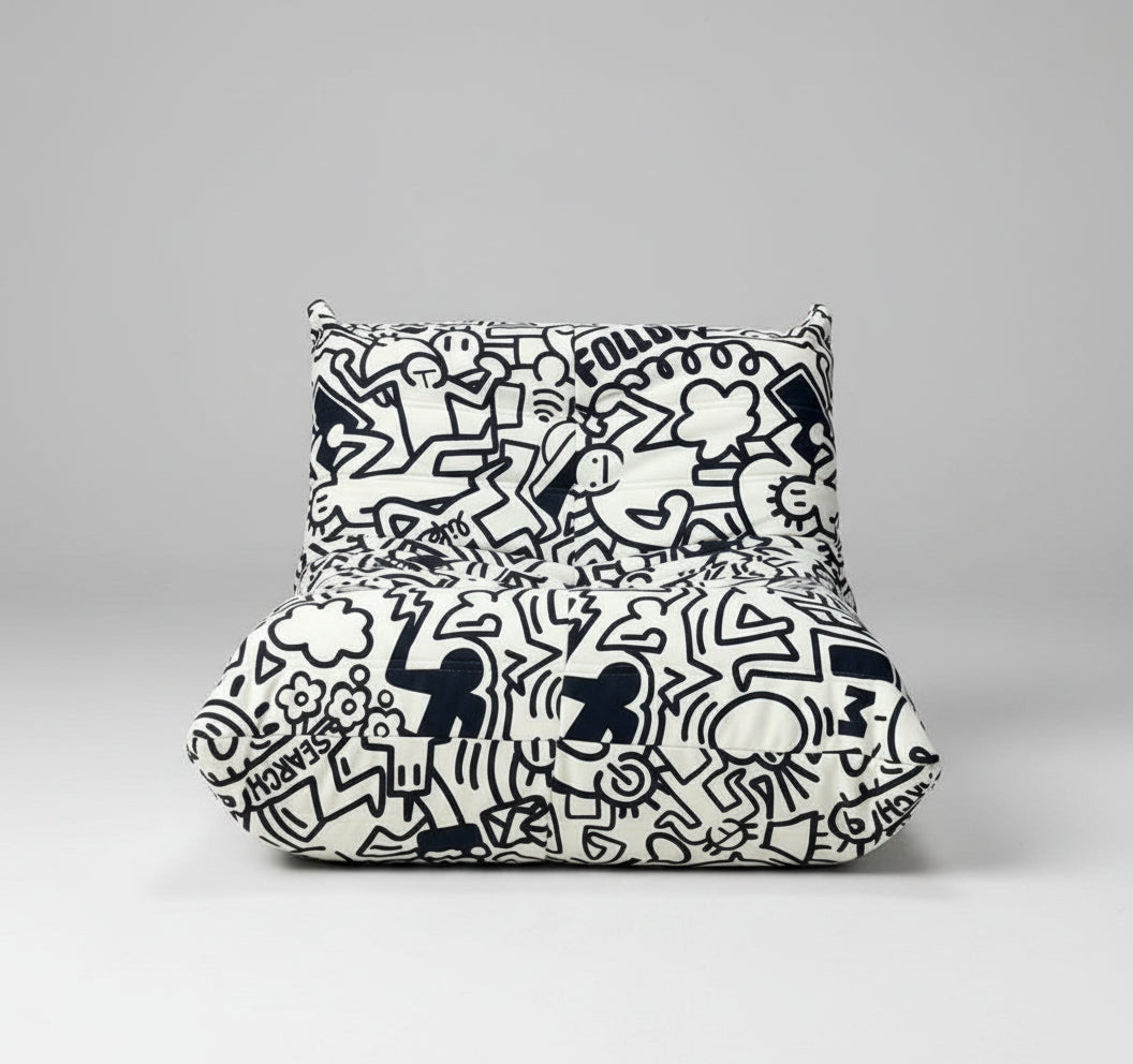 Black and white patterned bean bag chair on a gray background