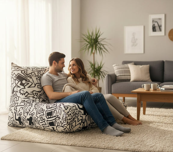 Couple sitting on a bean bag in a modern living room